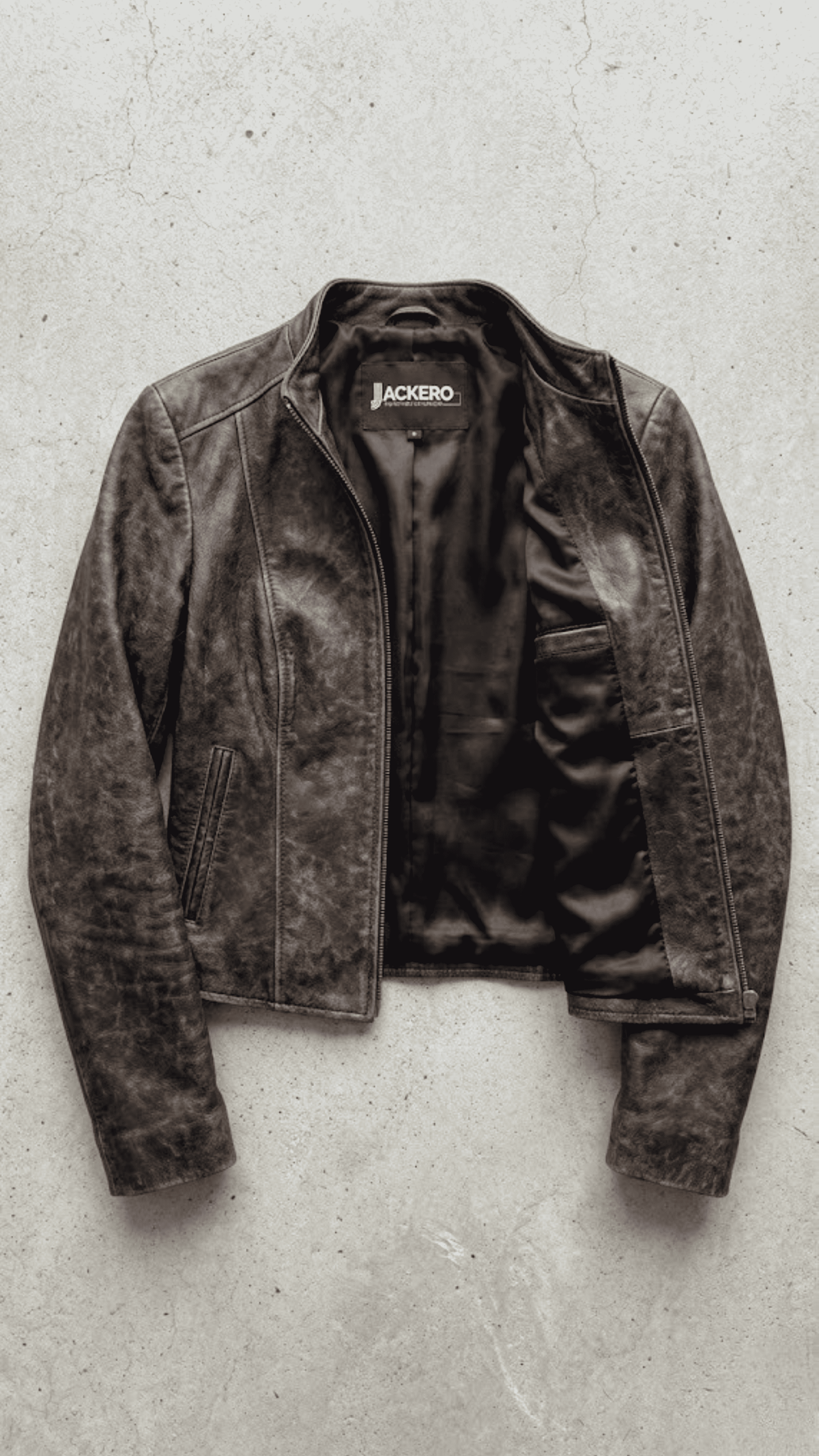 Jackero jacket flat lay photography of a high-end vintage wash dark brown leather coat displayed symmetrically on a solid neutral background.