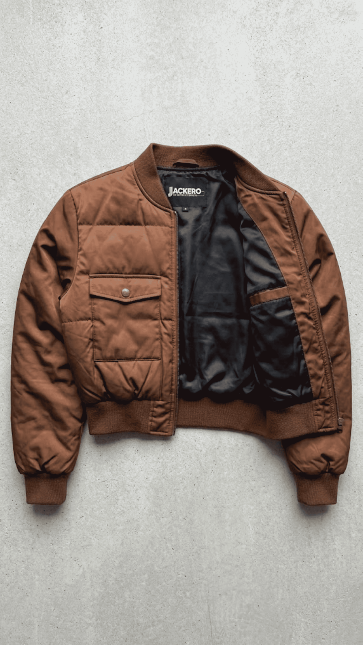 Jackero contemporary tan silk cotton blend jacket beautifully presented against a clean, minimalist studio backdrop.