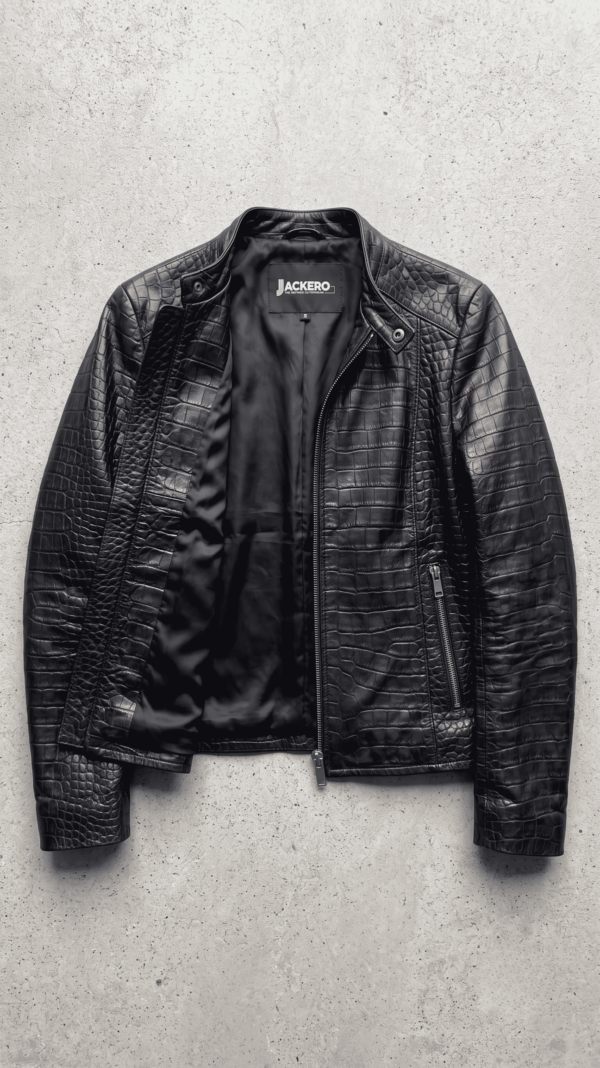 Jackero luxury women's black crocodile embossed leather jacket beautifully presented against a clean, minimalist studio backdrop.