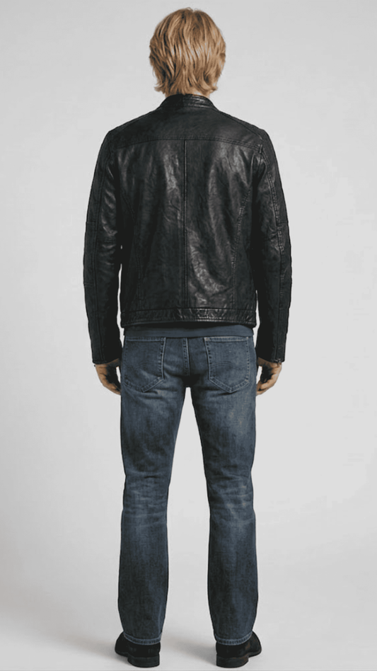 Regular fit men's black leather jacket displaying functional zippered chest pockets and a clean, comfortable profile.