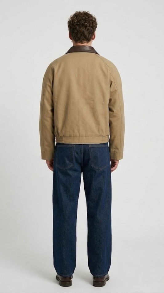 Minimalist beige leather outerwear with dark brown leather collar detailing flat lay view
