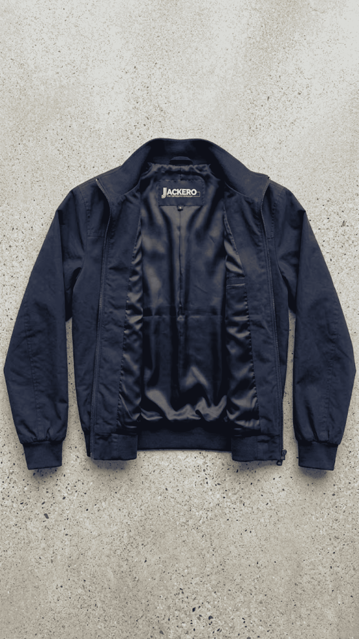 Flat lay presentation of Jackero dark navy blue cotton jacket showing unlined lightweight interior and inner brand tag