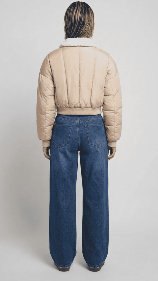 Regular fit women's off-white short line outerwear displaying clean tailored seams, side alignment, and a streamlined boxy silhouette.