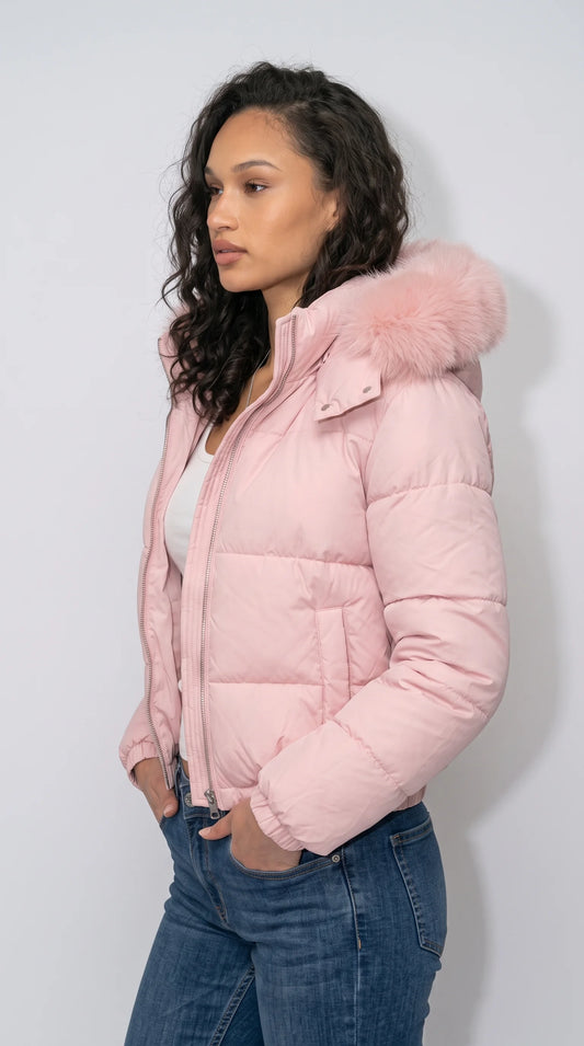 Stand out in the freezing city streets with this ultra-cozy Jackero pastel pink bubble coat, boasting a plush fur-trimmed hood that perfectly blends urban hype culture with winter glam.