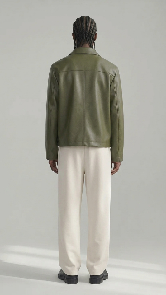 Men styling a premium sage green leather overshirt jacket over a neutral t-shirt, showcasing a clean minimalist streetwear look.