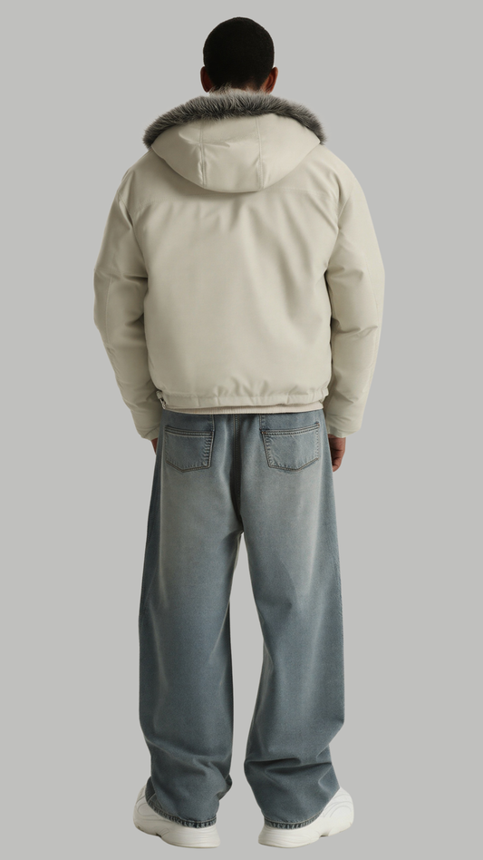 back profile showing the hood coverage and warmth of a white winter puffer jacket.