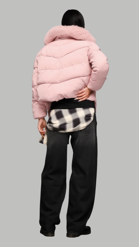 a premium baby pink winter coat showing the detailed quilted panels and fluffy fur trim on the hood.