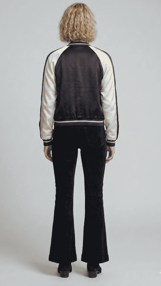 Breathable and lightweight dark navy striped jacket layered over a casual t-shirt for an effortless streetwear style.