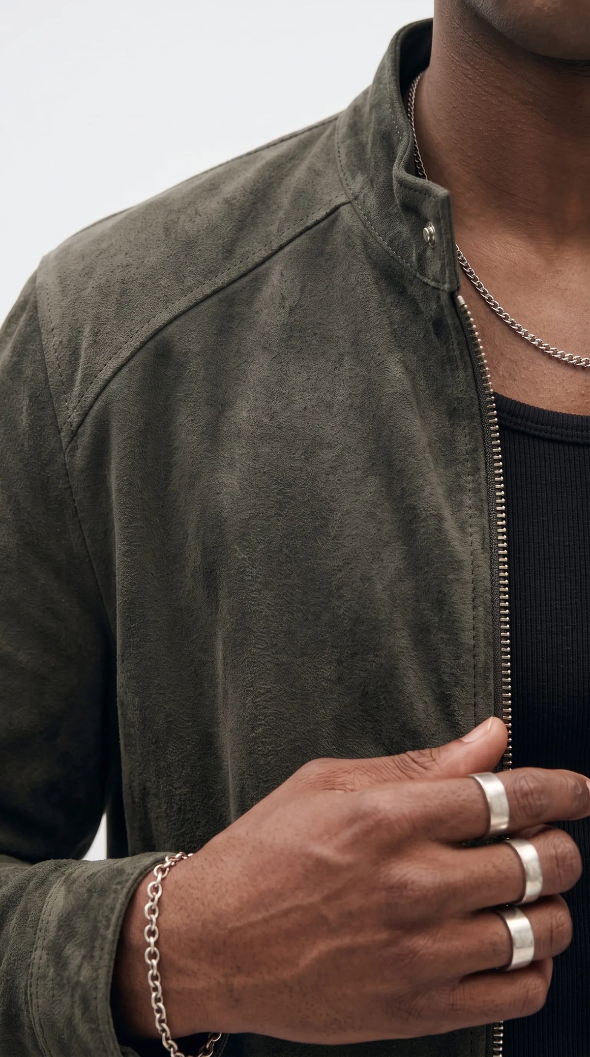 Classic dark grey suede winter jacket providing the perfect combination of warmth and modern streetwear aesthetic, now up for grabs on an exclusive sale.