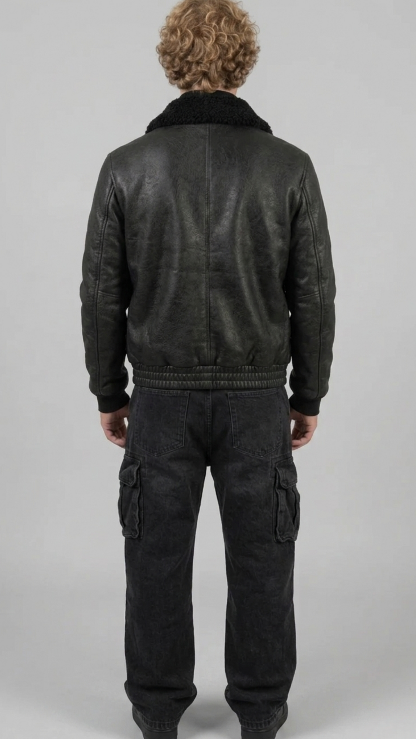 Mens premium all-black aviator jacket crafted from high-quality leather and plush black shearling.