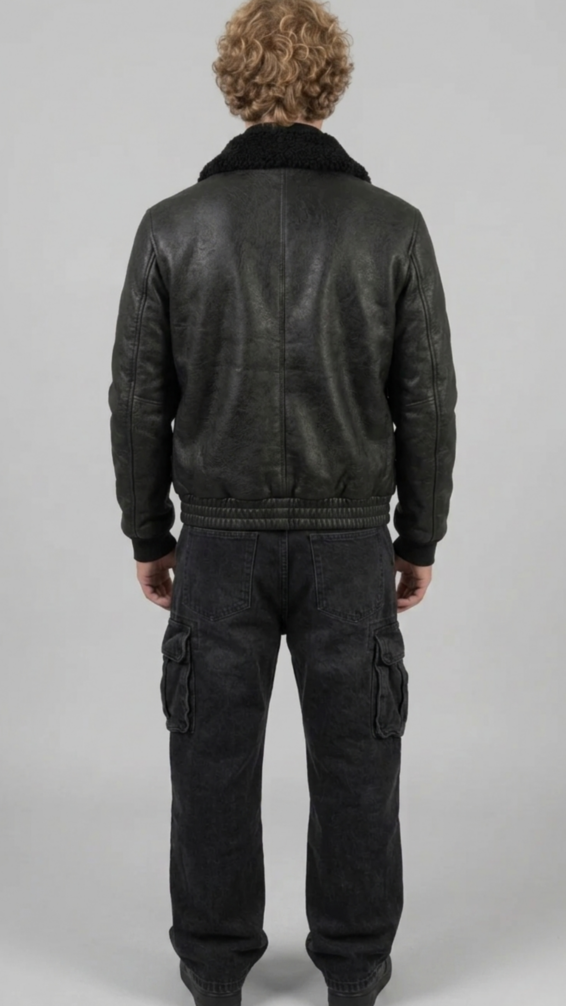 Mens premium all-black aviator jacket crafted from high-quality leather and plush black shearling.