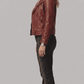 a model wearing a premium burgundy motorcycle leather jacket styled with black denim for a bold contrast.