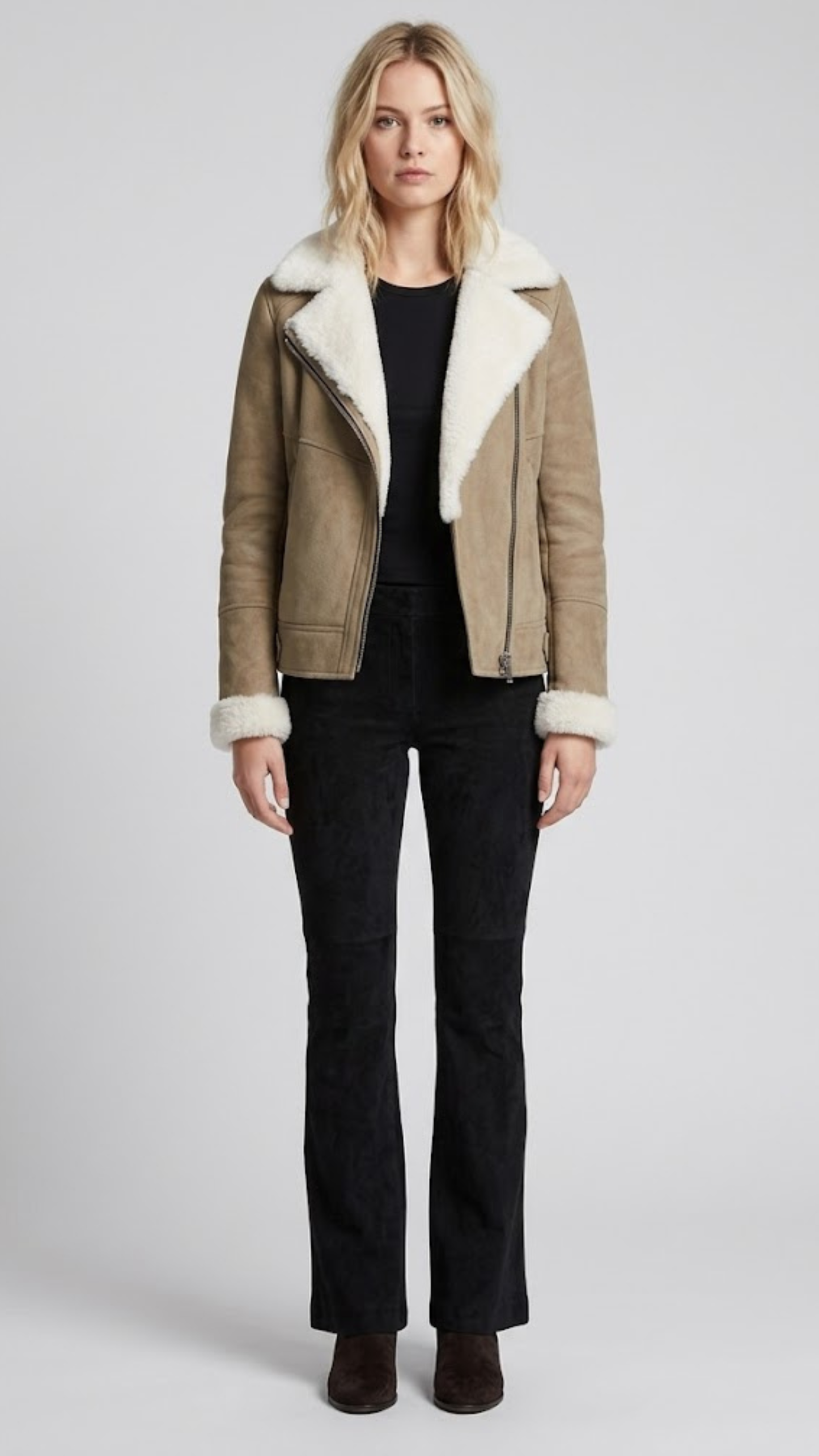 premium jackero beige suede jacket highlighting a clean zipper front and a thick, soft white shearling collar.