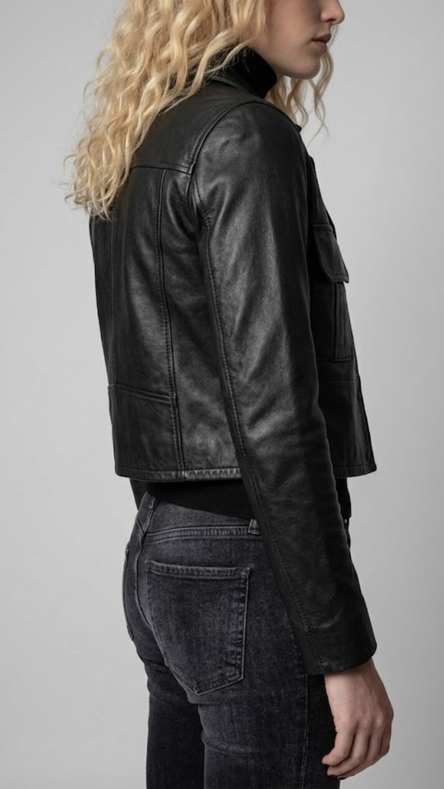 Close-up view of the fine craftsmanship, durable stitching, and high-quality leather texture on a black Jackero jacket.