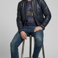 a sharp modern outfit centered around a luxury midnight navy genuine leather coat.