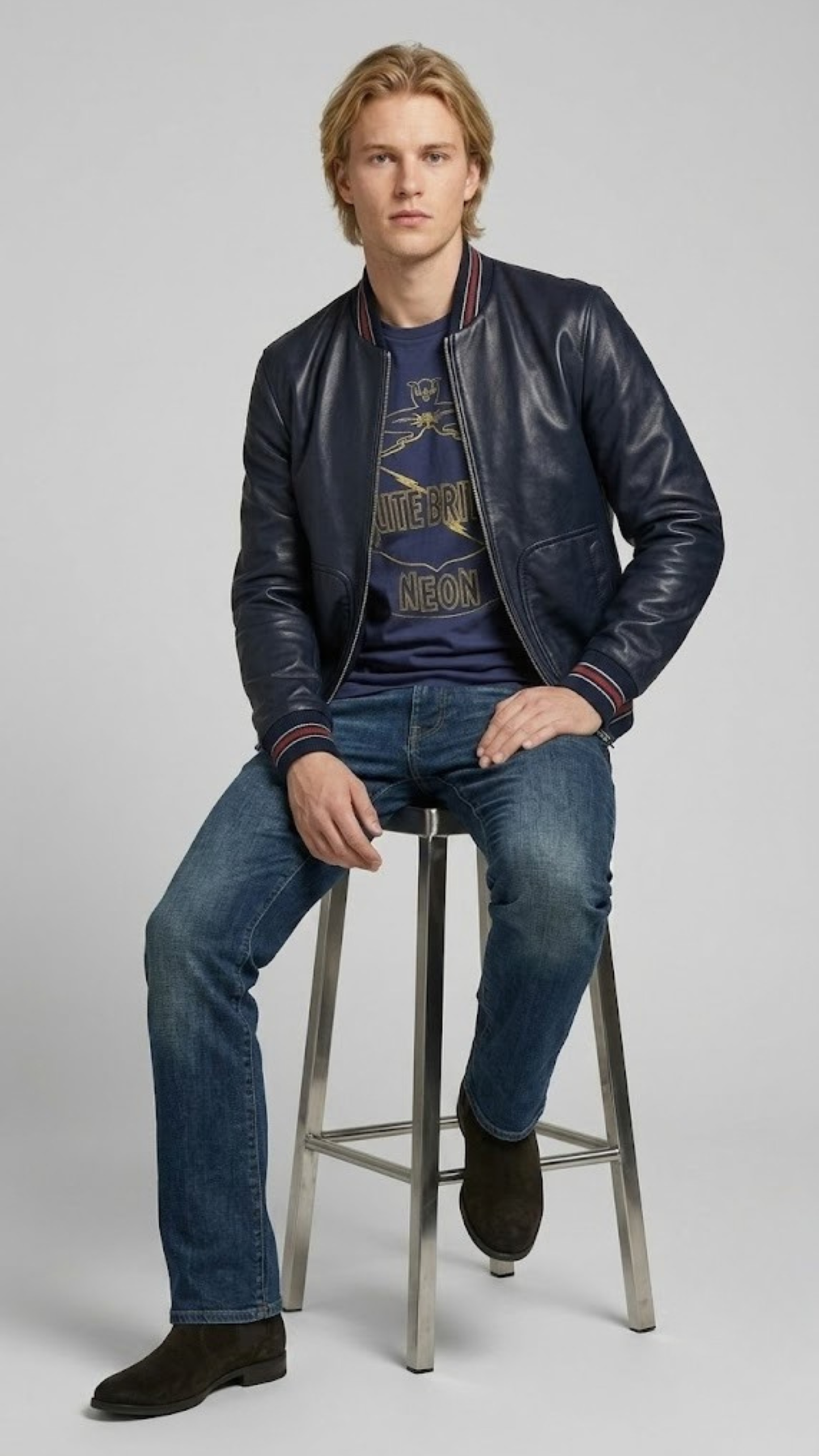 a sharp modern outfit centered around a luxury midnight navy genuine leather coat.