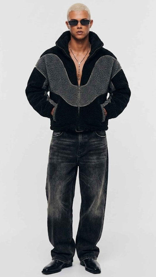Front view of oversized black and dark grey wool Y2K jacket featuring textured fleece finish and stand-up collar.