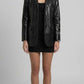 model wearing a jackero black crocodile embossed leather blazer with single breasted button closure