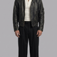 Jackero premium black distressed leather jacket showing the unique faded vintage finish and asymmetric front zipper.