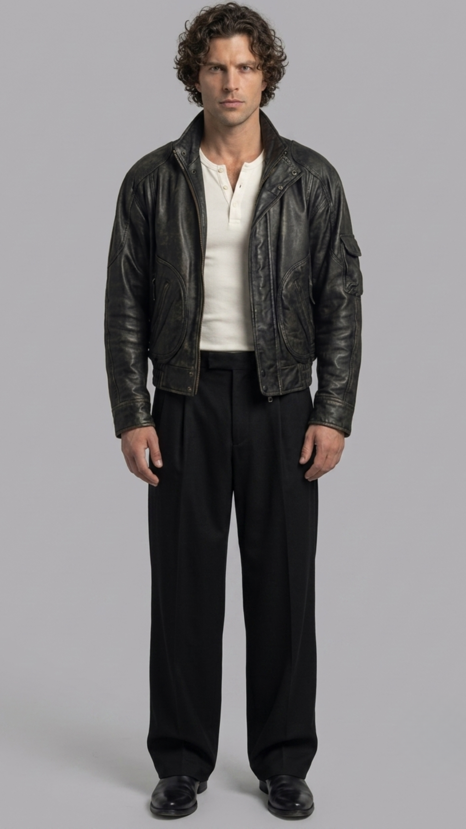 Jackero premium black distressed leather jacket showing the unique faded vintage finish and asymmetric front zipper.