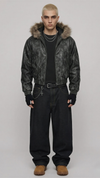 Black distressed leather Y2K jacket with a prominent fur hood shown from the front view.