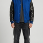 Jackero premium blue suede varsity jacket highlighting the striking contrast with black leather sleeves and button closure.