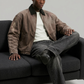 lightweight brown cotton canvas utility jacket designed for comfortable autumn layering and a smart casual look.