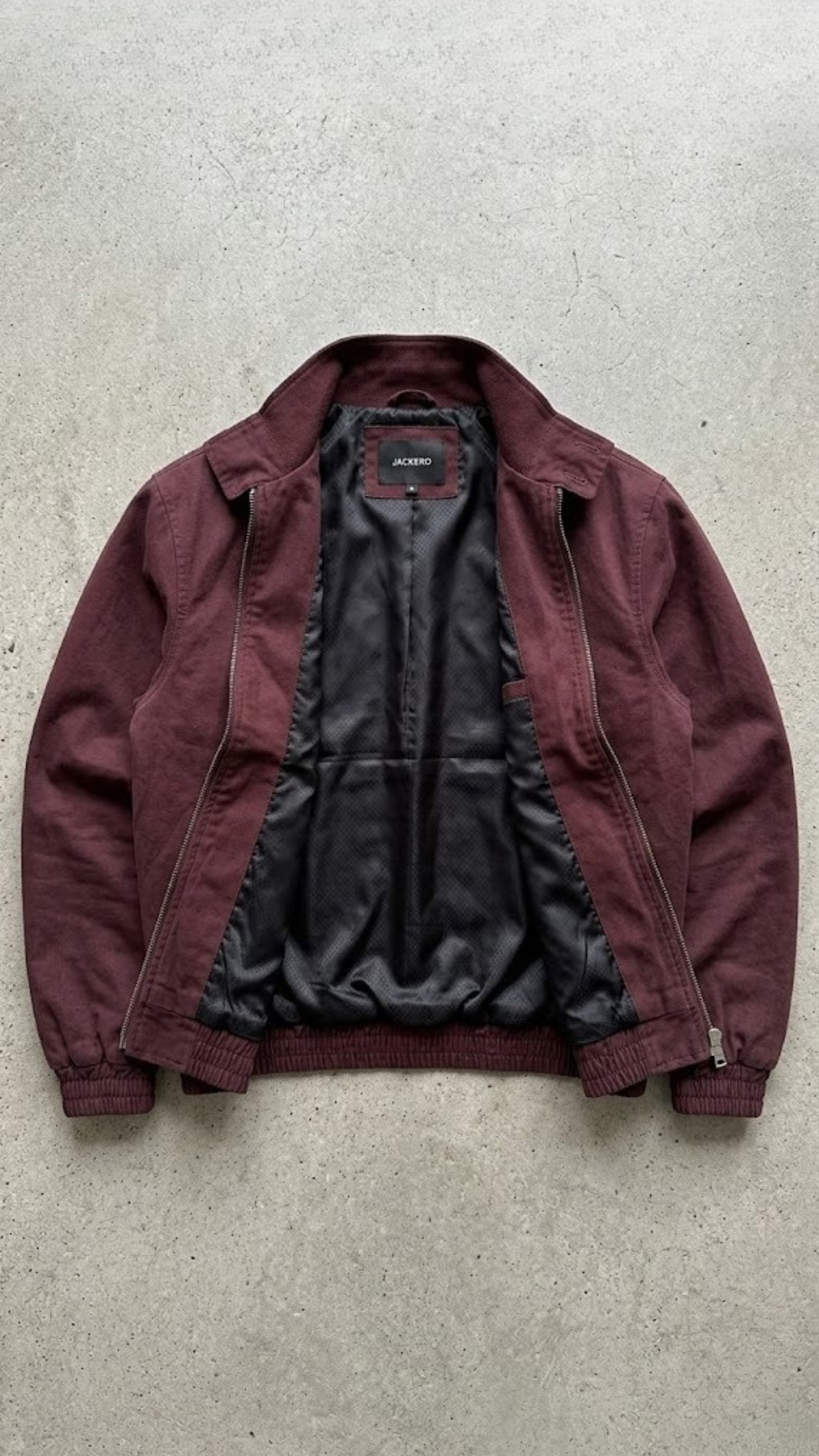 Flat lay studio photography of Jackero premium dark red cotton casual jacket