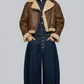stylish brown cropped aviator jacket with white shearling trim, styled for a modern winter streetwear look.