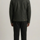 Straight-on back view of Jackero black leather trucker jacket highlighting the clean panel stitching.