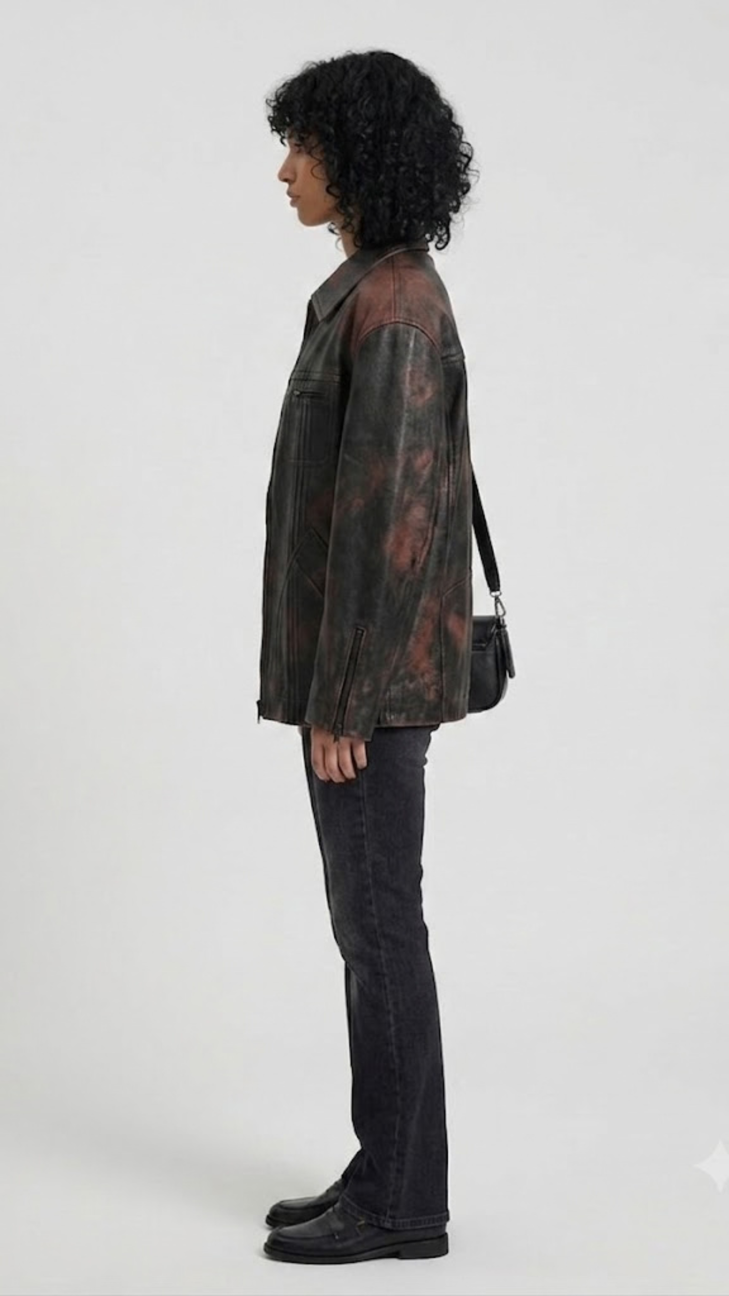 Urban streetwear casual styling featuring a vintage black distressed leather jacket with classic shirt-collar detail.