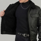 Stylish and warm all-black leather flight jacket with matching black shearling lining, ideal for winter outerwear.