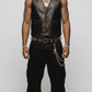 button up black leather vest highlighting a clean row of front buttons and a structured v-neck waistcoat profile.