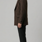 Men's sophisticated winter fashion showcasing a tailored dark chocolate brown wool overcoat for a sharp, formal look.