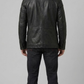 Versatile black leather field jacket layered over an urban outfit, perfect for combining practical utility with modern street fashion.