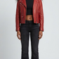 A professional studio front shot of the Jackero red leather biker jacket, featuring an iconic asymmetric zipper design and wide lapels.