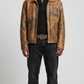Vintage light brown distressed leather jacket shown from the front view in a studio setup.
