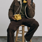Men's classic dark brown suede trucker jacket with cream fur collar, perfect for winter fashion.
