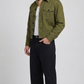 minimalist army green cotton jacket with simple cuffs and side pocket details