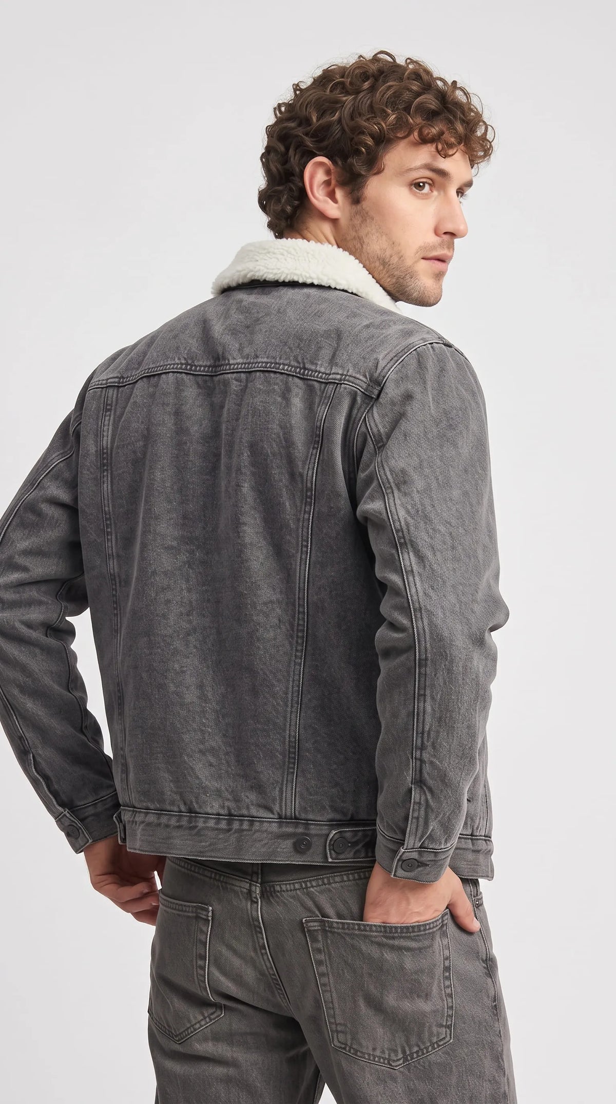An essential cold-weather layer, the cozy Jackero distressed grey sherpa denim jacket offers the perfect mix of rugged durability and engaging modern streetwear fashion for your everyday casual outfits.