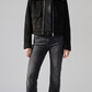 Front full view of premium dark black suede jacket showcasing a thick, rich dark chocolate faux shearling collar and heavy-duty front zipper.