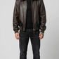 premium dark brown leather jacket paired with striking black crocodile texture panels.