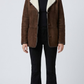 Jackero premium dark chocolate brown suede coat highlighting a wide, plush white shearling collar and button closures.