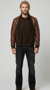 A professional studio front shot of the Jackero dark chocolate brown suede leather jacket, showcasing its rich matte finish and front zip style.