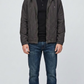 Front full view of premium dark grey silk cotton jacket showcasing a structured built-in hood design and clean center zipper.