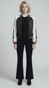 A dark navy blue striped silk cotton jacket with a sleek button-up front and neat collar.