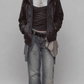 a JACKERO dark red vine oversized leather jacket showcasing a plush, contrasting black fur collar and heavy front zip.