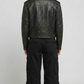 Straight-on back view of a minimalist black café racer leather jacket showcasing its structured paneling and fitted silhouette.