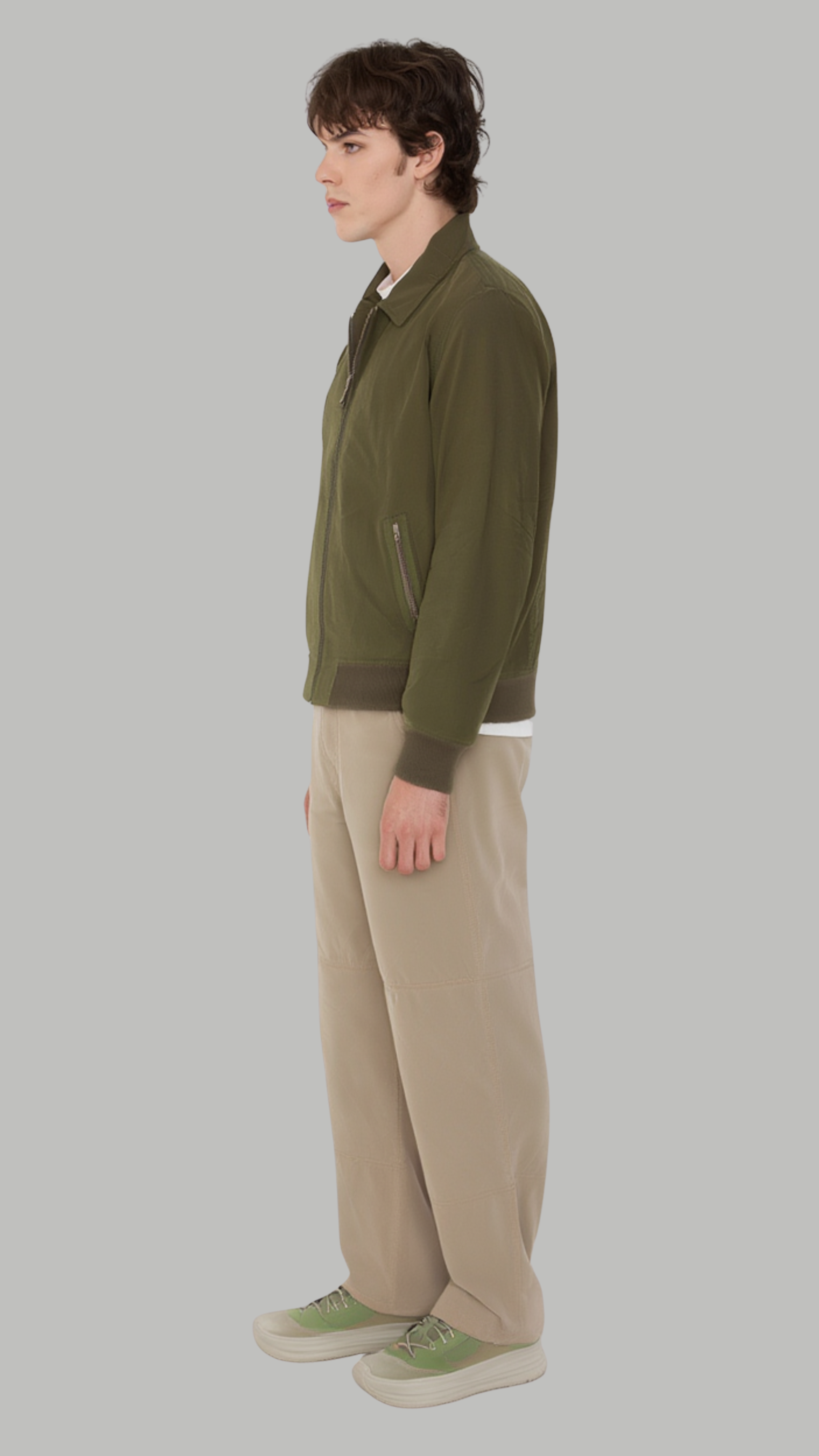 A durable olive green cotton jacket designed for functional everyday wear, combining field-ready utility with a stylish urban aesthetic