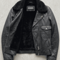 the Jackero premium tier black leather biker jacket on a clean studio background, emphasizing master craftsmanship.